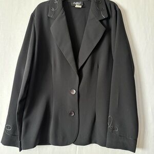 Chic Black Women's Blazer with embroidered accents.